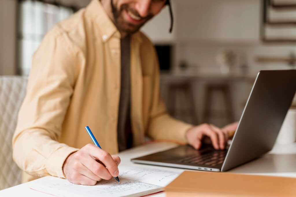 man-with-headset-having-video-call-laptop
